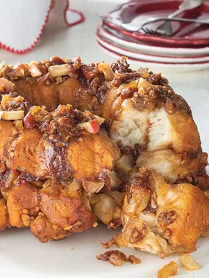 Paula Deen Apple Monkey Bread baked in a Bundt pan with cinnamon sugar and pecans