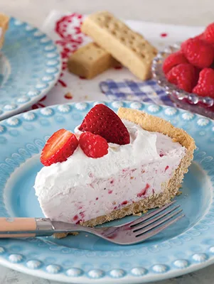 Paula Deen Berry Buttermilk Pie with fresh strawberries and raspberries on a shortbread cookie crust