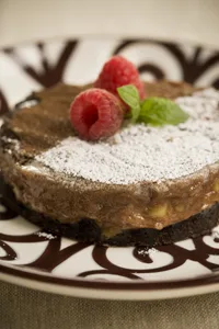 Paula Deen Double Chocolate Gooey Butter Cake in a baking pan with a fudgy cream cheese filling
