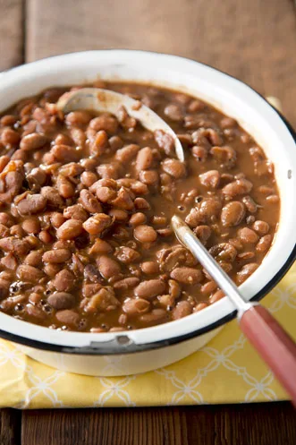 Bowl of Paula Deen slow cooker pinto beans with ham hocks