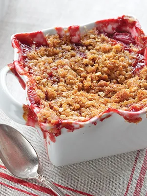 Paula Deen Strawberry Cobbler in a ramekin with a golden oat crumble topping