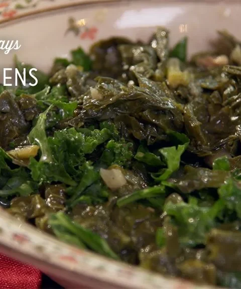 Paula Deen turnip greens simmered with a pig tail in a pot