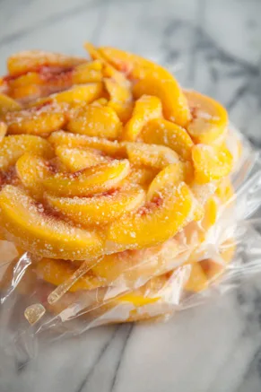 Paula Deen frozen peach pie filling, sugared peach slices frozen in a plastic-wrapped pie shape