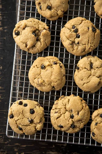 Paula Deen granola bar cookies with dried blueberries cooling on a wire rack