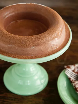 Paula Deen Mary Randolph's chocolate ice cream molded in a ring and dusted with cocoa on a jadeite cake stand